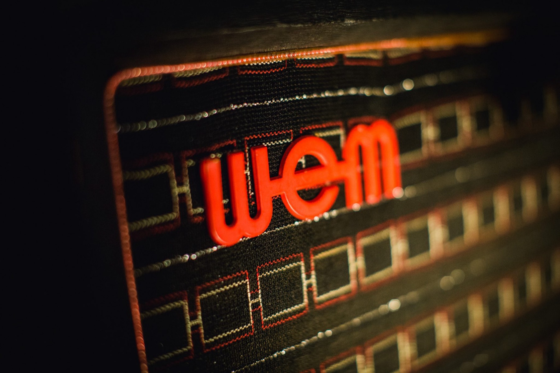 WEM speaker cabinet with a red logo