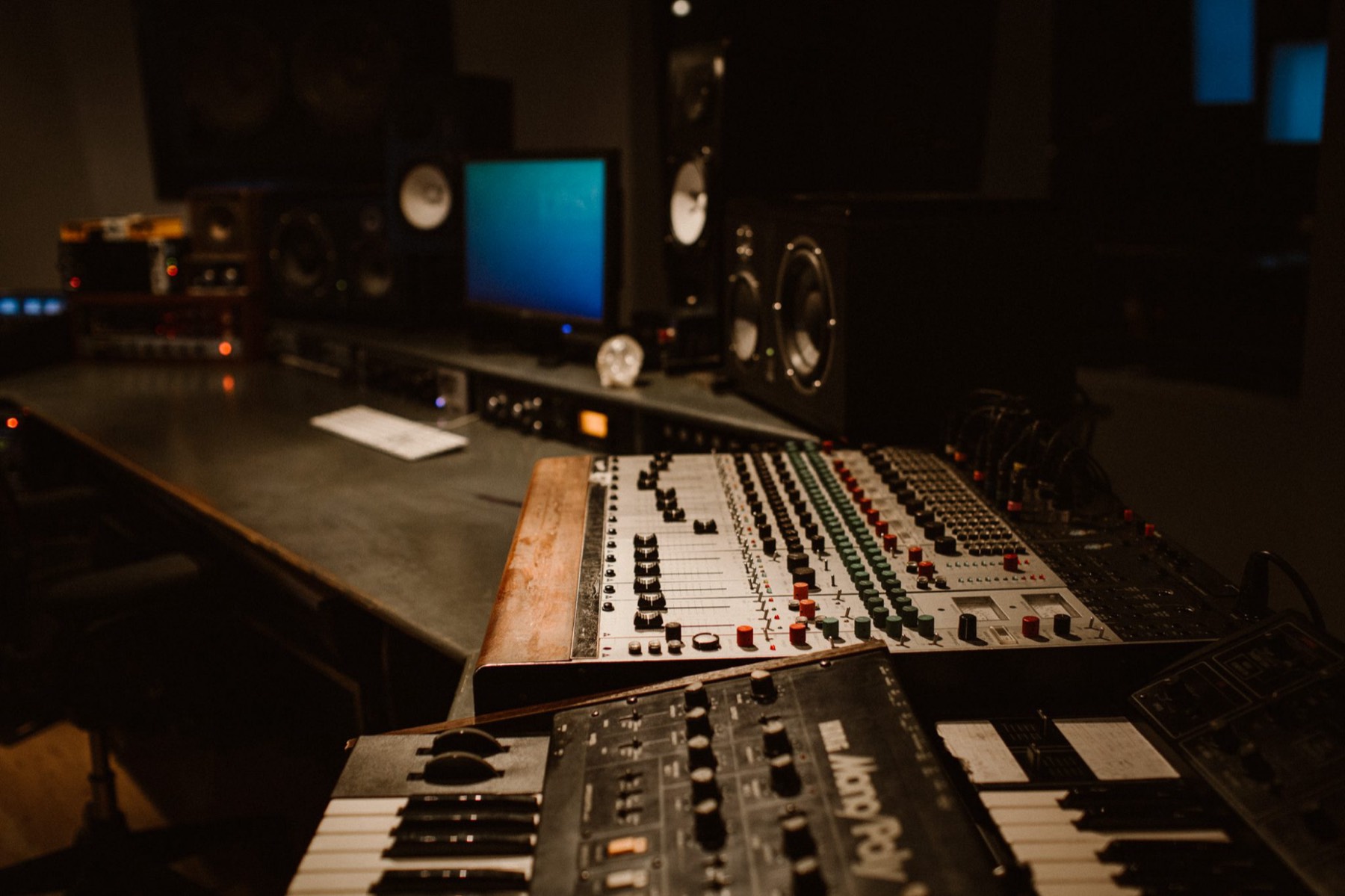 Control room desk with synths and outboard
