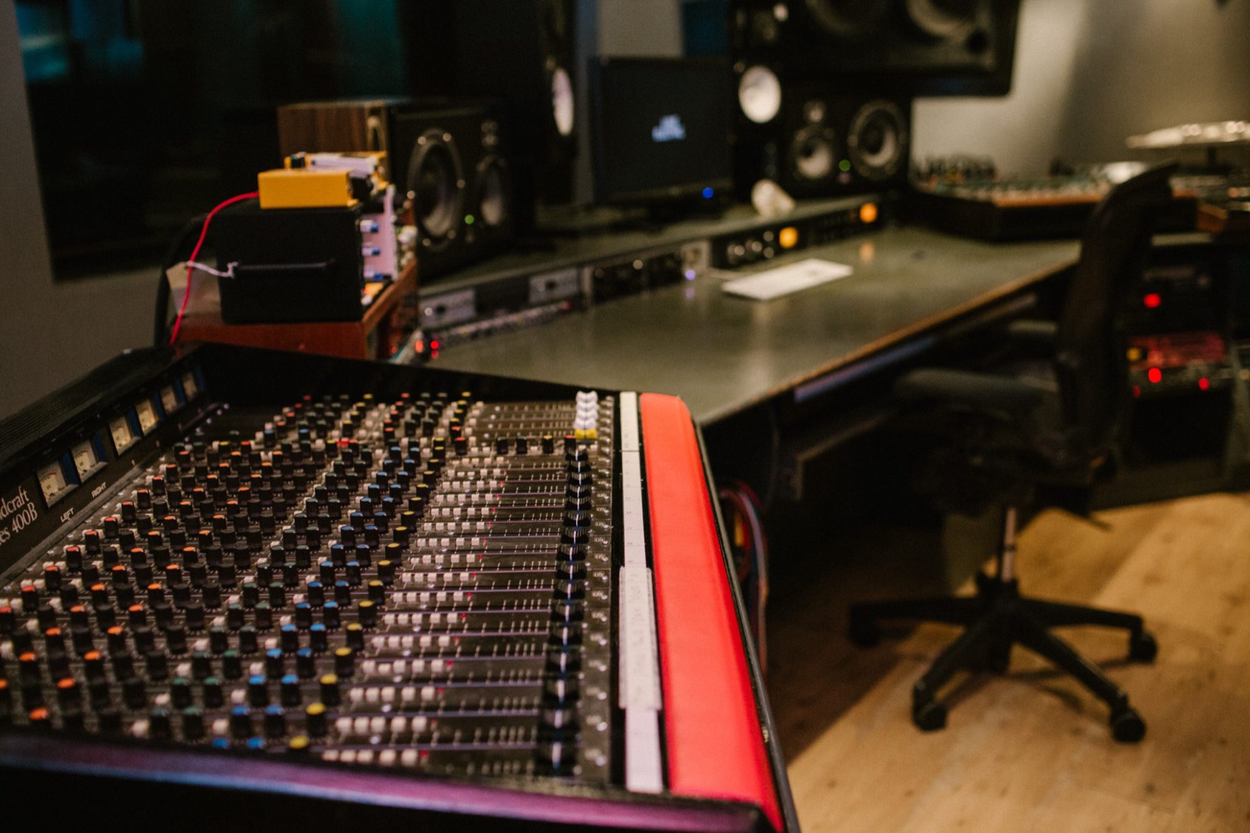 Mixing desk and producer's chair in the control room